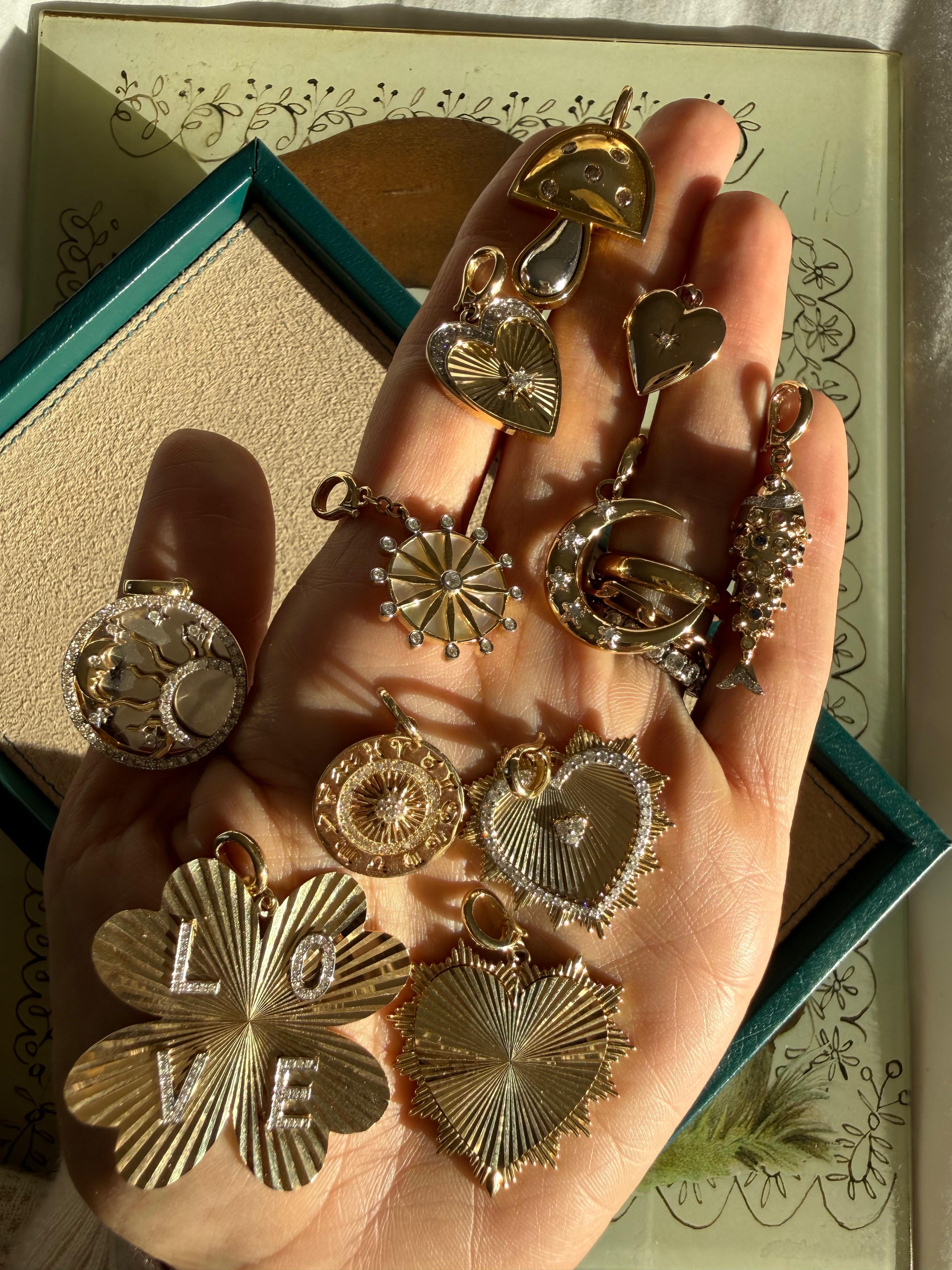 Radiant Heart Charm